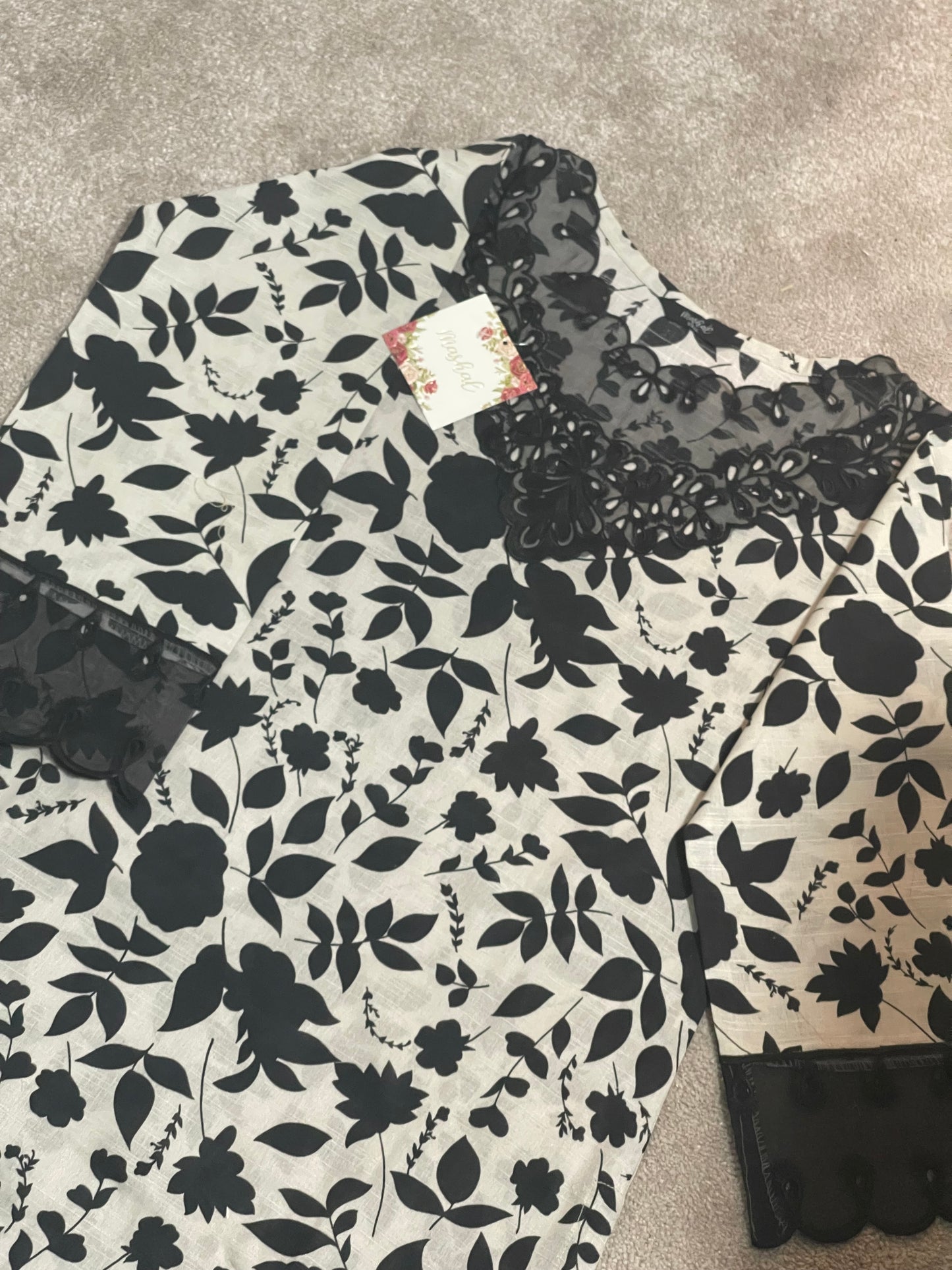 Monochrome Elegance: Floral Charm with Lace Highlights