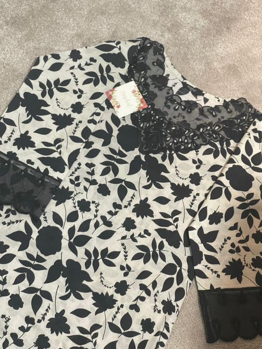 Monochrome Elegance: Floral Charm with Lace Highlights